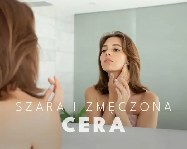 Kobieta ogląda w lustrze swoją szarą, zmęczoną cerę, zastanawiając się nad jej przyczynami.